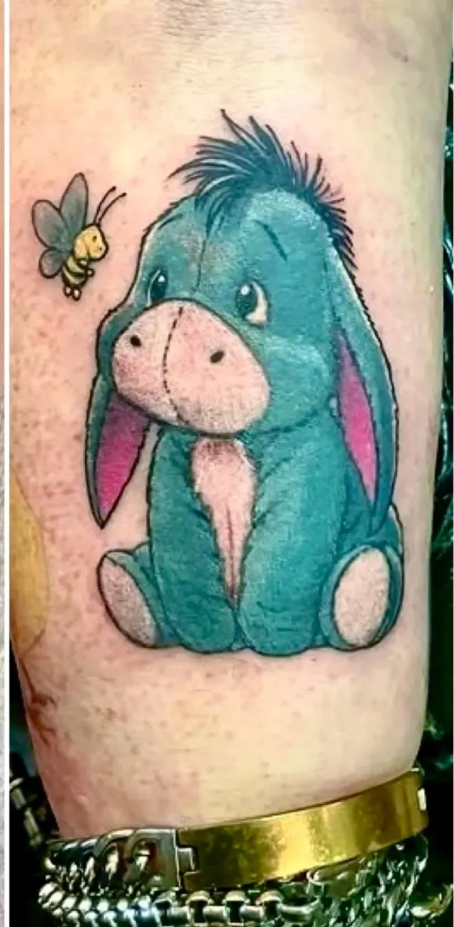 New school colour Eeyore cartoon tattoo with a bee, N9 Tattoo Studio, Edmonton